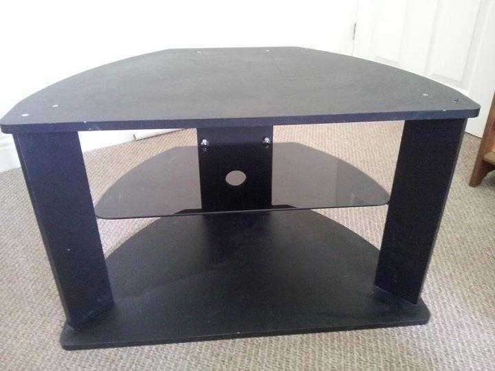 Black wood and glass TV stand.