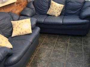 Blue two seater sofa and chair