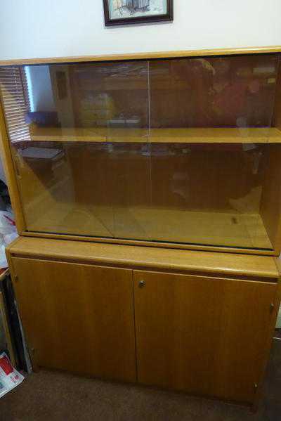 Book case with glass sliding doors and cupboard underneath