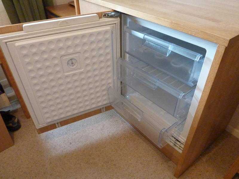 Bosch built under integrated Freezer in Unit With cupboard