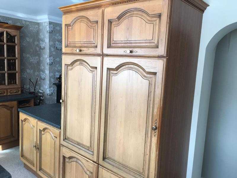 Bosch integrated larder fridge and freezer units, with solid oak door Schreiber tall cabinets