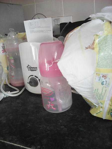 Bottle warmer, newborn nappies and stage 2 nappies plus 2nd stage tommee tippee bottles