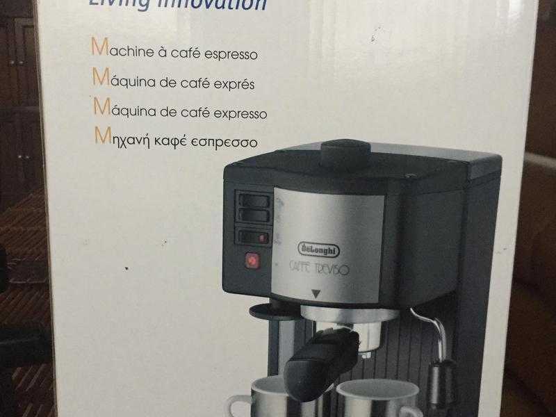 boxed, only once used De Longhi coffee machine in superb condition