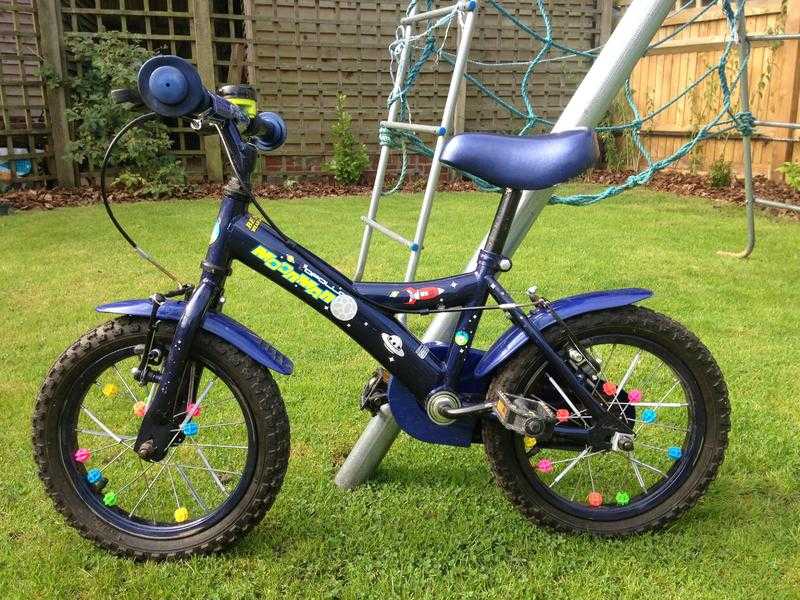 Boy039s bike. 14quot wheels. Apollo Moonman. Dark blue with space dcor. Childs bicyle.