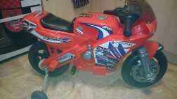 boys red Electric motorbike age 35 yrs