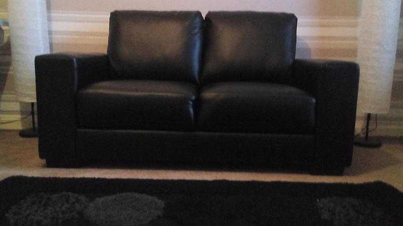 Brand new 2 seater faux leather settee
