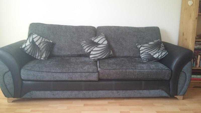 Brand new 4 seater sofa