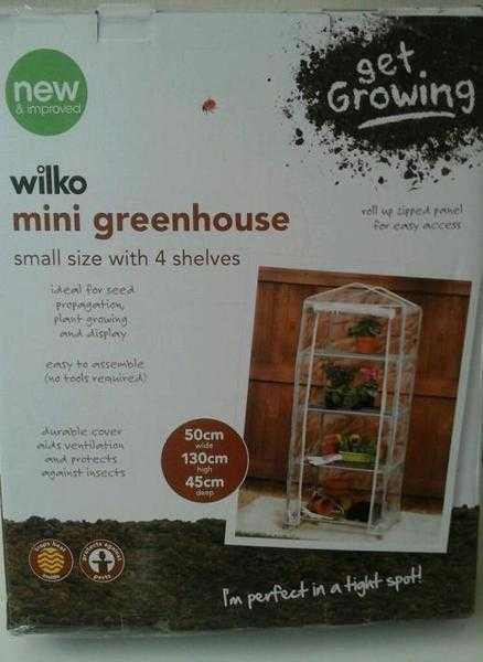 Brand new 4 tier mini greenhouse with cover