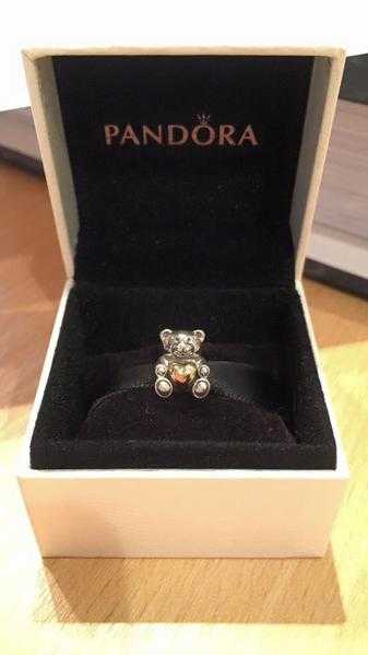 Brand new and boxed. Limited Edition. Original PANDORA silver Teddy bear with gold heart charm