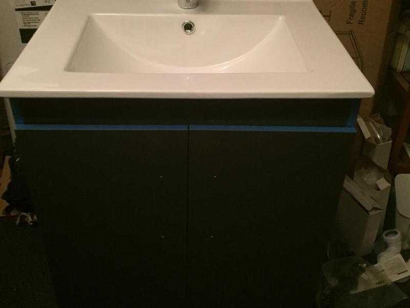 Brand new basin with cabinet