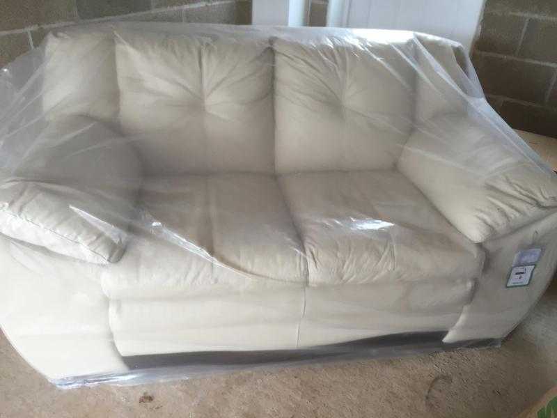 Brand new DFS 2 seater leather sofa in beige