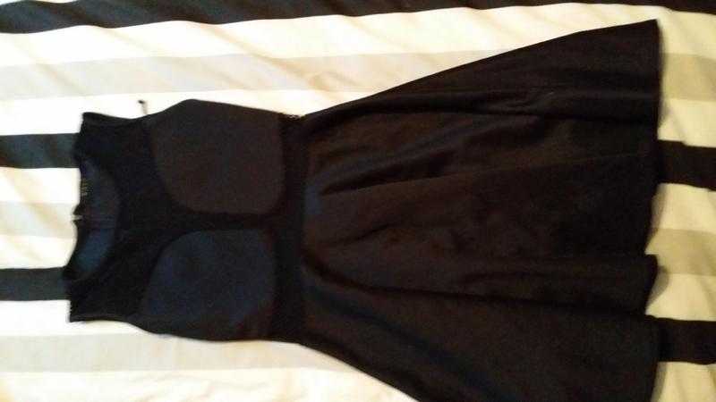 Brand new size 8 black dress