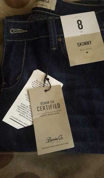 Brand new size 8 womans jeans