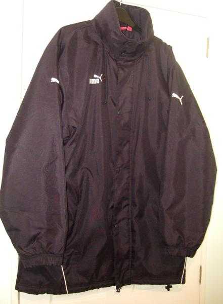 Brand new without tags. Man039s all in one waterproof, zipped Puma Jacket Size M.