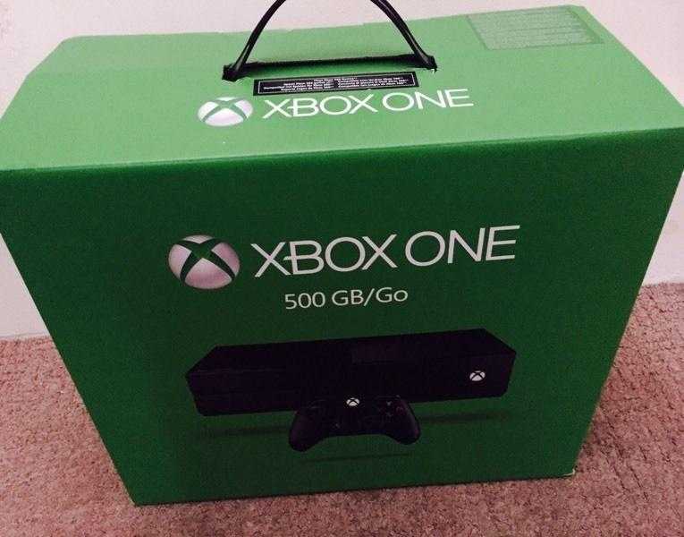 Brand new Xbox - hardly used with Tomb Raider Game