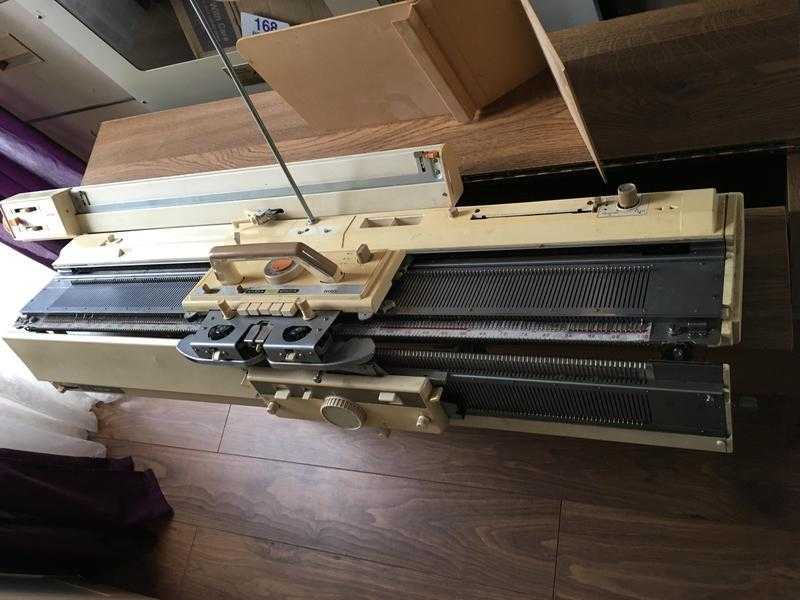 Brother 830 knitting machine in cabinet with ribber