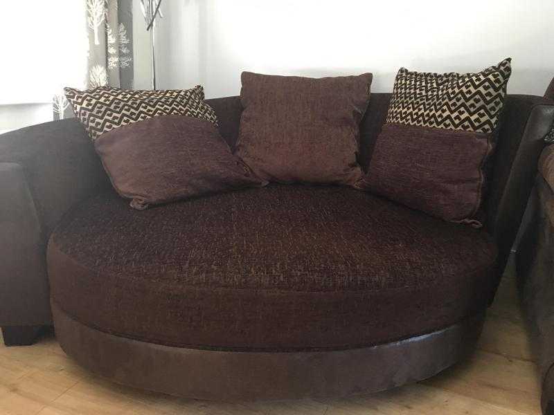 Brown dfs cuddle chair