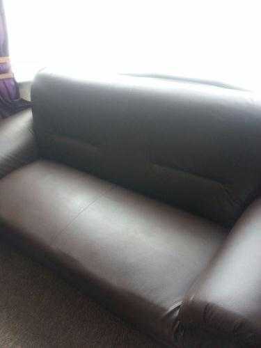 brown faux leather sofa