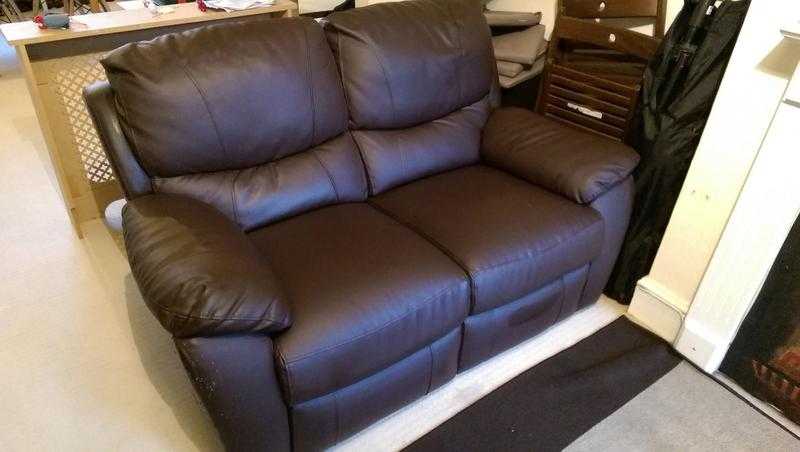 Brown leather 2 seater and 3 seater, dual reclining sofas.