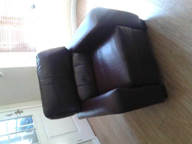 Brown Leather armchair.