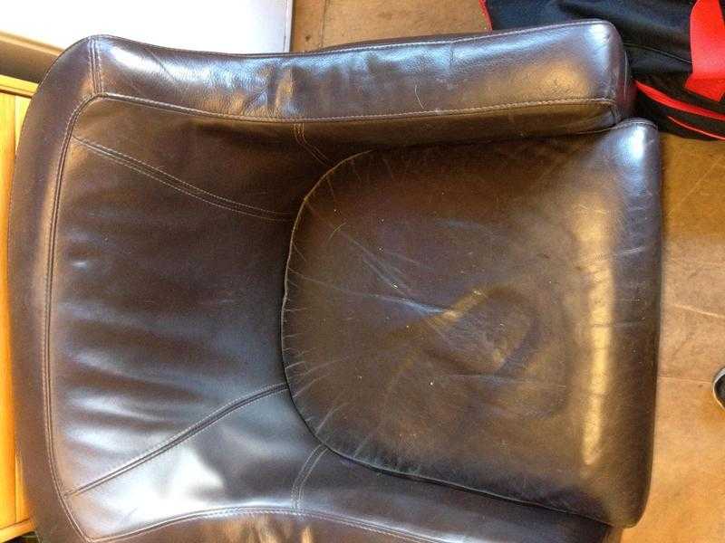 brown leather barrel chair