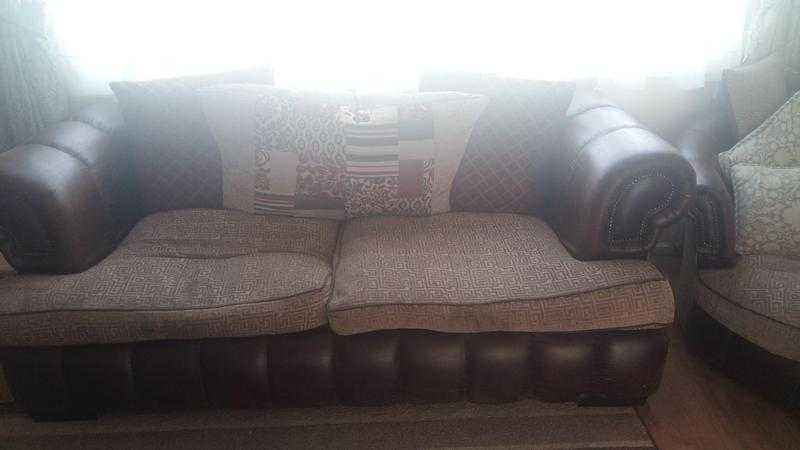 Brown leather sofa and table suite