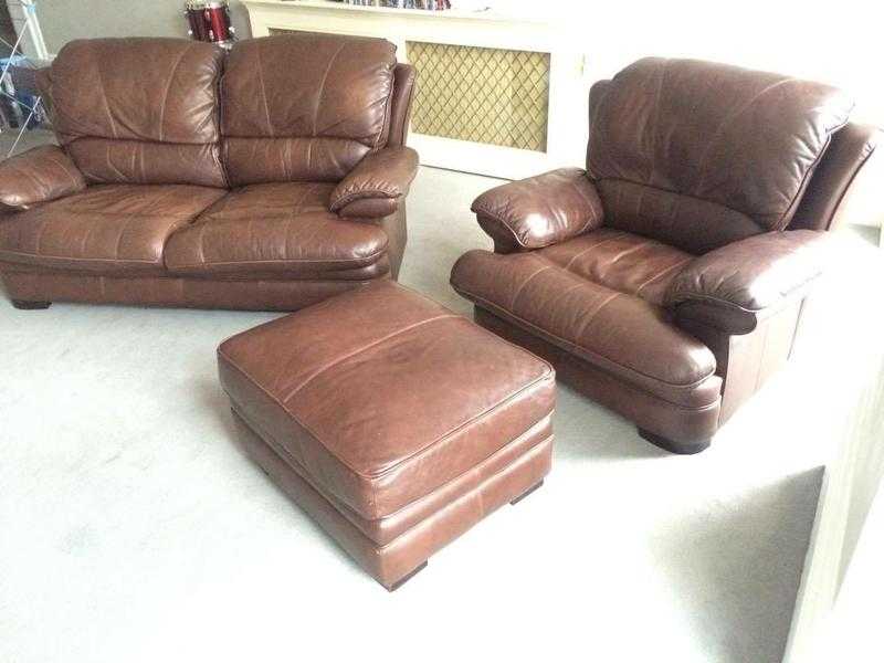 Brown leather sofa with matching armchair and footstool