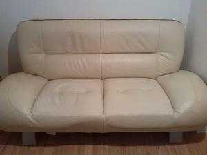 Brown leather three seater sofa, chair and footstool