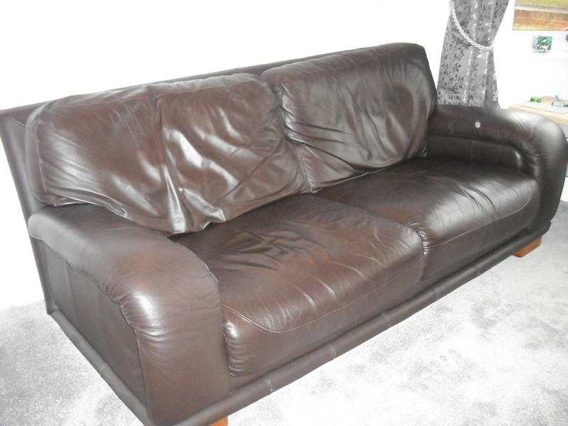 Brown Leather three seater sofa. chair and pouffe