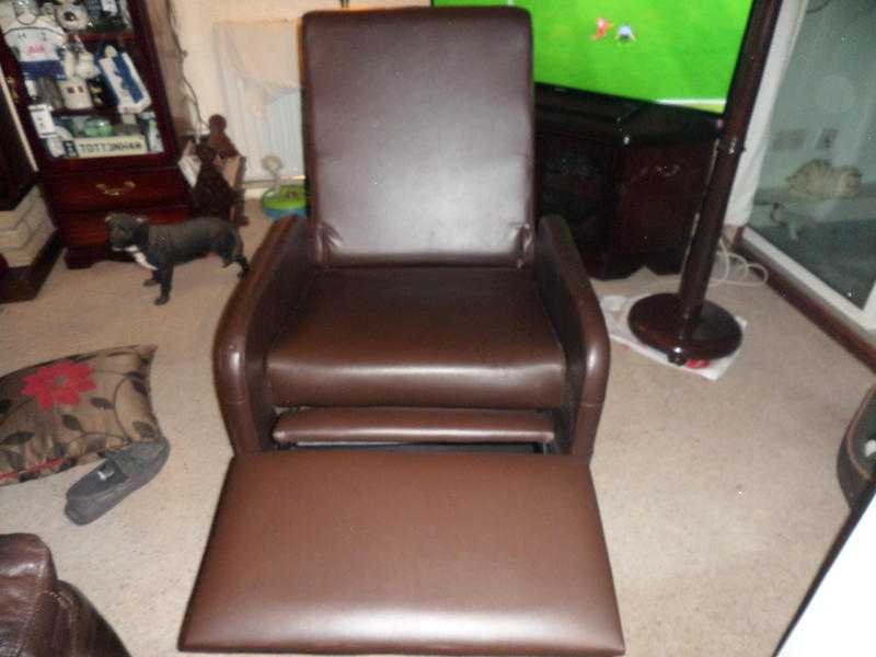 Brown recliner armchair