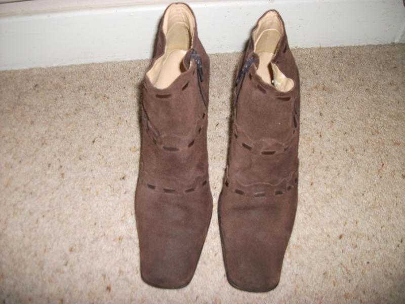 Brown suede ankle boots.