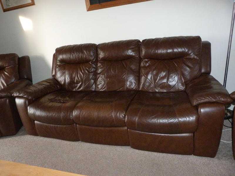 Brown three piece fully reclining leather suite