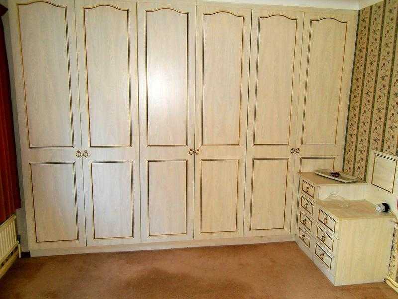 Built-in bedroom furniture, Wardrobes (3), dressing table and bed headboard and end tables