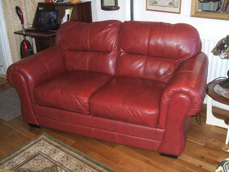 BurgundyRed Leather Sofa....