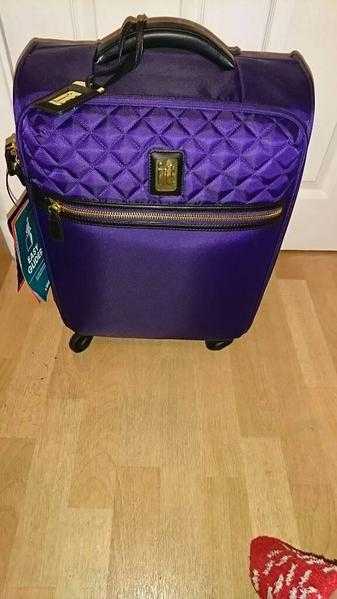 Cabin luggagecabin suitcase brand new with tags Purple and gold