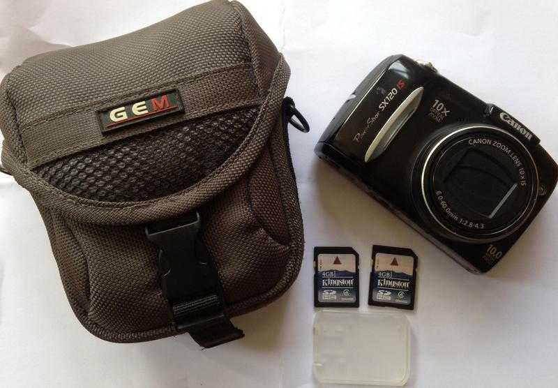 Canon PowerShot SX120 IS Digital Camera, two 4GB SD cards and protective case