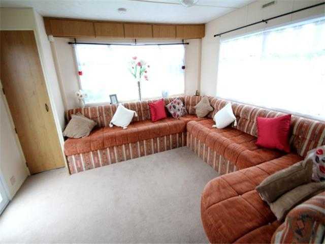 caravan sited on naze marine holiday park(private sale)