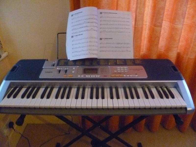 Casio LK 110 keyboard with stand