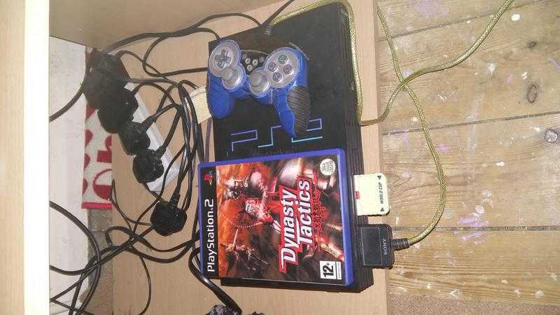 Cheap ps2 for sale with a game and controller and 2 memory cards