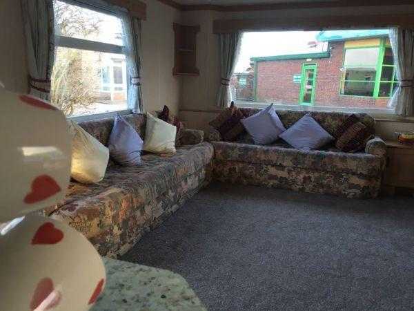 Cheap starter caravan12ft wideDouble glazedheateden suite12 month seasonEast coast.Nr Brid