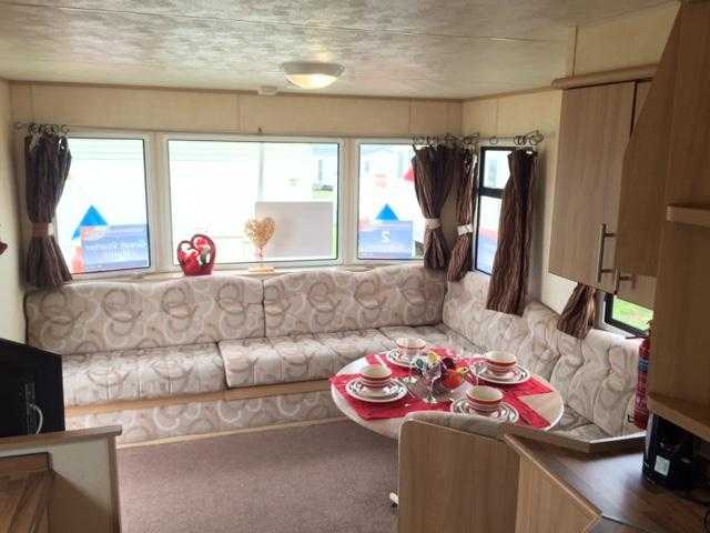 CHEAP STATIC CARAVANS FROM 11,995. BUY NOW PAY LATER WITH JUST A 10 DEPOSIT AT BARMSTON BEACH HOLIDAY PARK NEAR BRIDLINGTON EAST YORKSHIRE.