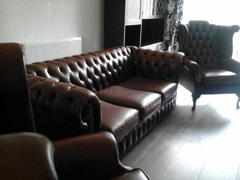 CHESTERFIELD SOFA AND TWO MATCHING WING BACK CHAIRS