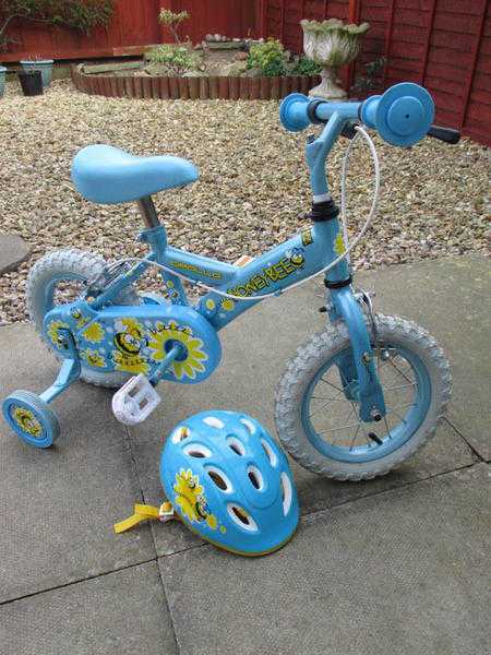 childs bike with stabalizers and helmet