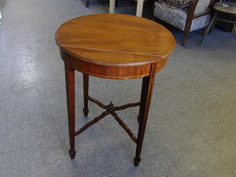 Circular Side Table In Need Of Repair