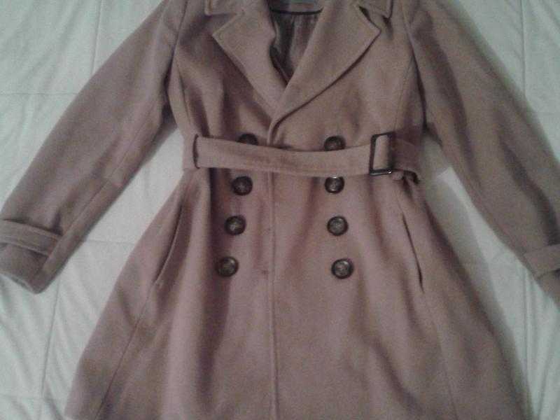 Coat from Dorothy Perkins. Size 10. Beige colour. Two large pockets. Large brown buttons amp a belt.