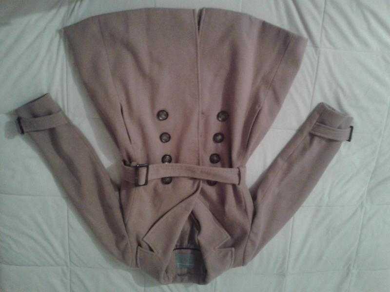 Coat from Dorothy Perkins. Size 10. Beige colour. Two large pockets. Large brown buttons amp a belt.