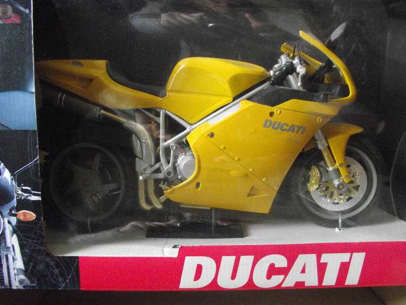 collectable motorbikes in boxes