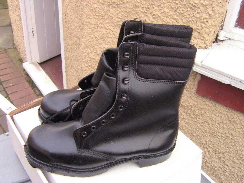 COMBAT BOOTS NEW . STILL IN BOX