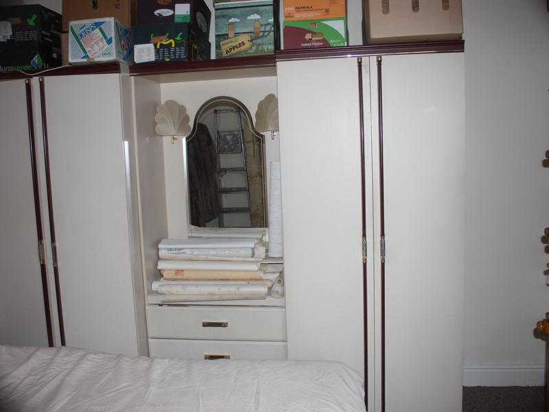 Combined wardrobes and vanity unit.