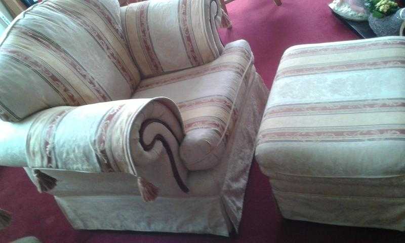 Comfortable Armchair and matching footrest set.